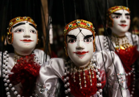 The Burmese puppetry figures of “nat-ga-daw,” or the spiritual medium, at Khin Maung Htwe’s home theatre