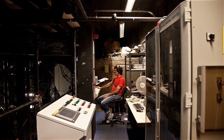 The control panel and operator of the National Theatre's drum revolve